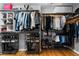 Organized walk-in closet featuring shelves, racks, and ample space for clothing, shoes, and accessories at 446 Angus Way, Highlands Ranch, CO 80129