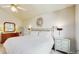 Vaulted bedroom features a king bed, side tables, and natural light at 1089 E 131St Dr, Thornton, CO 80241