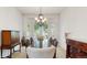 Dining room featuring a large table, chandelier, and plenty of natural light at 1089 E 131St Dr, Thornton, CO 80241