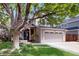 Charming home with a two-car garage, inviting porch, and mature trees at 1089 E 131St Dr, Thornton, CO 80241