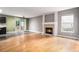 Spacious living room with a fireplace and sliding glass doors at 2786 S Cathay Way, Aurora, CO 80013