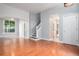 Bright living room featuring hardwood floors and a staircase at 2786 S Cathay Way, Aurora, CO 80013