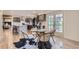 Eat in kitchen features a center island with seating and modern appliances adjacent to the back yard at 5720 E Caley Ave, Centennial, CO 80111