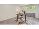 Bright home office with a modern desk, comfortable chair, and natural light at 5720 E Caley Ave, Centennial, CO 80111