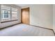 Bright bedroom features natural light from window and closet at 11197 W 64Th Pl, Arvada, CO 80004