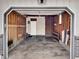 Unfinished garage with some wall damage at 6943 Ingalls St, Arvada, CO 80003
