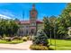 Image of the courthouse surrounded by green lawns and trees on a clear day at 1221 Illinois St # 2E, Golden, CO 80401