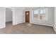 Cozy living room with neutral carpet and walls, window and natural light at 367 S Jasmine St, Denver, CO 80224