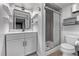 Modern bathroom with a glass-enclosed shower and sleek white vanity at 10262 S Royal Eagle Ln, Highlands Ranch, CO 80129