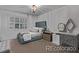 Cozy bedroom featuring neutral tones, comfortable bedding, and soft lighting at 10262 S Royal Eagle Ln, Highlands Ranch, CO 80129