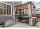 Outdoor hot tub with pergola is situated near a stock tank pool and offers relaxation and entertainment at 10262 S Royal Eagle Ln, Highlands Ranch, CO 80129