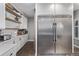 Kitchen featuring stainless steel refrigerator and ample counter space at 10262 S Royal Eagle Ln, Highlands Ranch, CO 80129