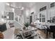 Elegant foyer showcasing a grand staircase, soaring ceilings, and an abundance of natural light at 10262 S Royal Eagle Ln, Highlands Ranch, CO 80129