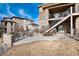 Beautiful backyard patio features a dining area and well-maintained landscaping at 10751 Manorstone Dr, Highlands Ranch, CO 80126