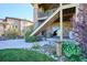 Spacious backyard with a stone walkway and plenty of room for outdoor activities at 10751 Manorstone Dr, Highlands Ranch, CO 80126