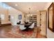 Elegant dining room with a skylight, hardwood floors, and decorative furniture perfect for gatherings at 10751 Manorstone Dr, Highlands Ranch, CO 80126