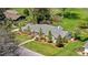 Charming aerial view of home with landscaped yard, patio, and nearby playground at 21 Fairway Ln, Littleton, CO 80123