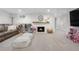 Cozy basement with fireplace, couch, and large space for entertaining with carpet flooring at 21 Fairway Ln, Littleton, CO 80123