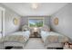 Shared ' bedroom with decor, plush carpet, and a window overlooking the yard at 21 Fairway Ln, Littleton, CO 80123