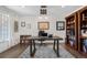 Stylish home office boasts built-in bookshelves, a sleek desk, and ample storage space at 21 Fairway Ln, Littleton, CO 80123
