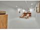 Finished basement with neutral carpet, recessed lighting, and a cozy seating area at 11496 E Wesley Ave, Aurora, CO 80014