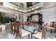 Formal dining room featuring a marble floor, mirrored ceiling, and designer wallpaper at 2552 E Alameda Ave # 47, Denver, CO 80209