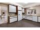 Bright kitchen with white cabinets, neutral countertops, and updated appliances at 2552 E Alameda Ave # 47, Denver, CO 80209