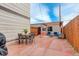 Inviting backyard with a patio, pergola, outdoor seating, and a privacy fence, ideal for relaxing and gatherings at 3720 Jason St, Denver, CO 80211