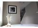 A view of a hallway leading to stairs with a framed photograph on the wall at 3720 Jason St, Denver, CO 80211