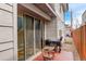 Cozy patio with sliding glass doors, outdoor seating, and a grill, perfect for entertaining at 3720 Jason St, Denver, CO 80211