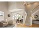 Open foyer with high ceilings, hardwood floors, and a staircase leading to the upper level at 1996 Clipper Dr, Lafayette, CO 80026