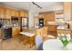 Spacious kitchen with island, stainless steel appliances, and a sunny breakfast nook at 1996 Clipper Dr, Lafayette, CO 80026