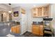 Basement kitchenette featuring a sink, appliances, and cabinetry, ideal for a functional living space at 1996 Clipper Dr, Lafayette, CO 80026