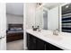 Bathroom features a double sink vanity with sleek fixtures and finishes at 10580 Greycliffe Dr, Highlands Ranch, CO 80126