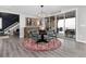 Charming dining space with a round table, stylish decor, and access to an outdoor patio offering great views at 10580 Greycliffe Dr, Highlands Ranch, CO 80126