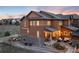 A two-story home with inviting porch, walkway, private driveway and landscaping at 10580 Greycliffe Dr, Highlands Ranch, CO 80126