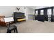 Charming loft area with a piano and decor, ideal for a music room or study at 10580 Greycliffe Dr, Highlands Ranch, CO 80126