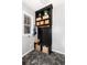 Charming mudroom with built-in bench, storage shelves, and decorative baskets for organization at 10580 Greycliffe Dr, Highlands Ranch, CO 80126