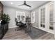 Stylish office space with modern desk, a comfortable chair, and plenty of natural light at 10580 Greycliffe Dr, Highlands Ranch, CO 80126