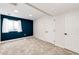 Cozy bedroom offers a soft carpet, ample natural light, and a convenient closet at 21743 Farmingdale Ct, Parker, CO 80138