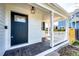 Inviting front porch with wood flooring, perfect for relaxing and enjoying the outdoors at 21743 Farmingdale Ct, Parker, CO 80138