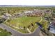 Aerial view showing community soccer field, landscaping and walking path at 10163 W 38Th Ave, Wheat Ridge, CO 80033