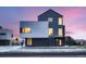 Stunning modern home with unique architectural design and eye-catching mixed material exterior at 10163 W 38Th Ave, Wheat Ridge, CO 80033