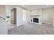 Carpeted basement includes a fireplace and a glimpse into an adjacent bathroom, versatile for Gathering at 1880 E 81St Pl, Denver, CO 80229