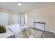 Neutral bedroom with soft carpet, closet and a door to the bathroom at 1880 E 81St Pl, Denver, CO 80229