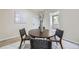 Charming dining area with seating for four and a bright, neutral color scheme at 1880 E 81St Pl, Denver, CO 80229
