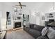 Inviting living room with fireplace and abundant natural light, creating a cozy atmosphere at 5875 W Asbury Pl, Lakewood, CO 80227