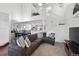Bright and airy open living space with a vaulted ceiling and access to the dining room at 5875 W Asbury Pl, Lakewood, CO 80227