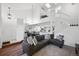 Open-concept living area with seamless flow to the dining room and kitchen, great for entertaining at 5875 W Asbury Pl, Lakewood, CO 80227