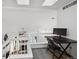 Lofted office space overlooking the living room has a desk and lots of light at 5875 W Asbury Pl, Lakewood, CO 80227